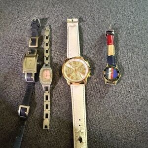 Elegant Watch Collection with Gold and Cream Accents
